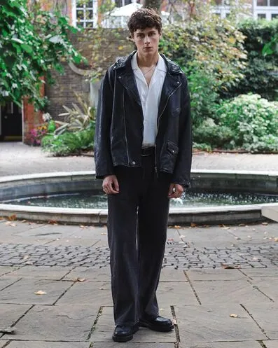 Man standing near fountain