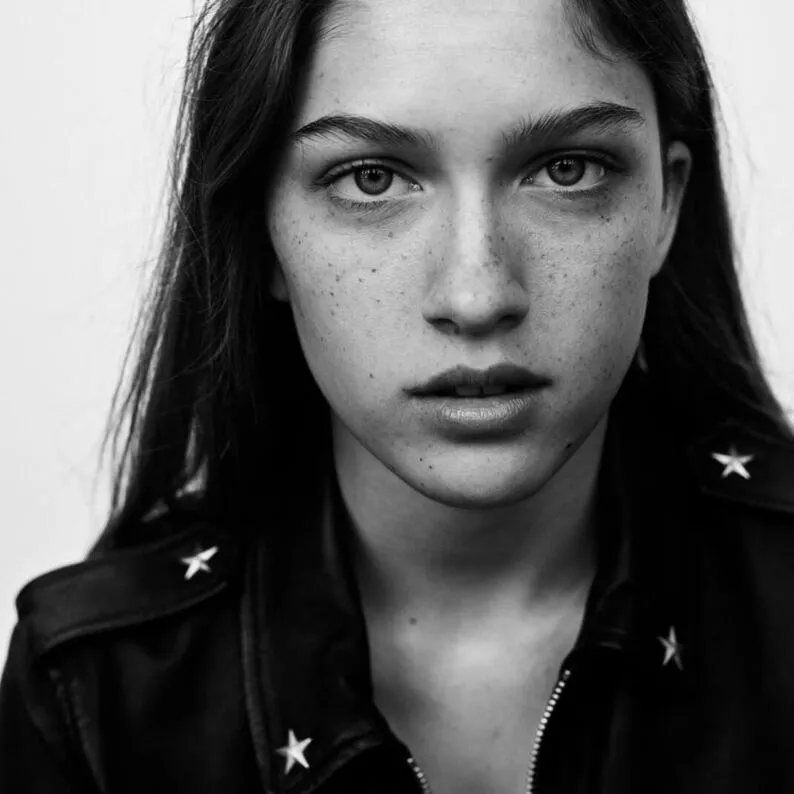 Wall of old Singer sewing machines in a store