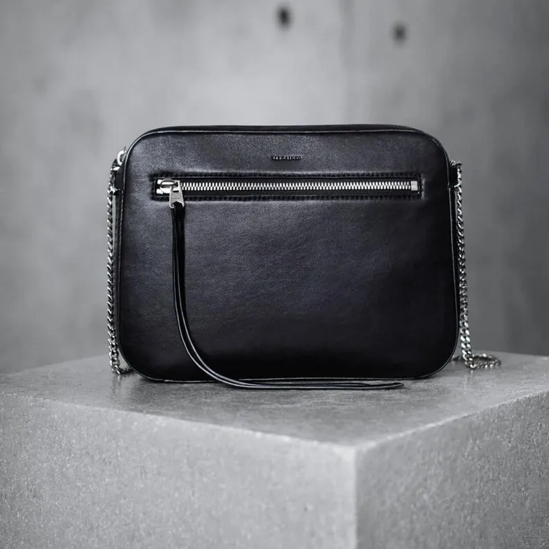 Black AllSaints handbag with a chain handle
