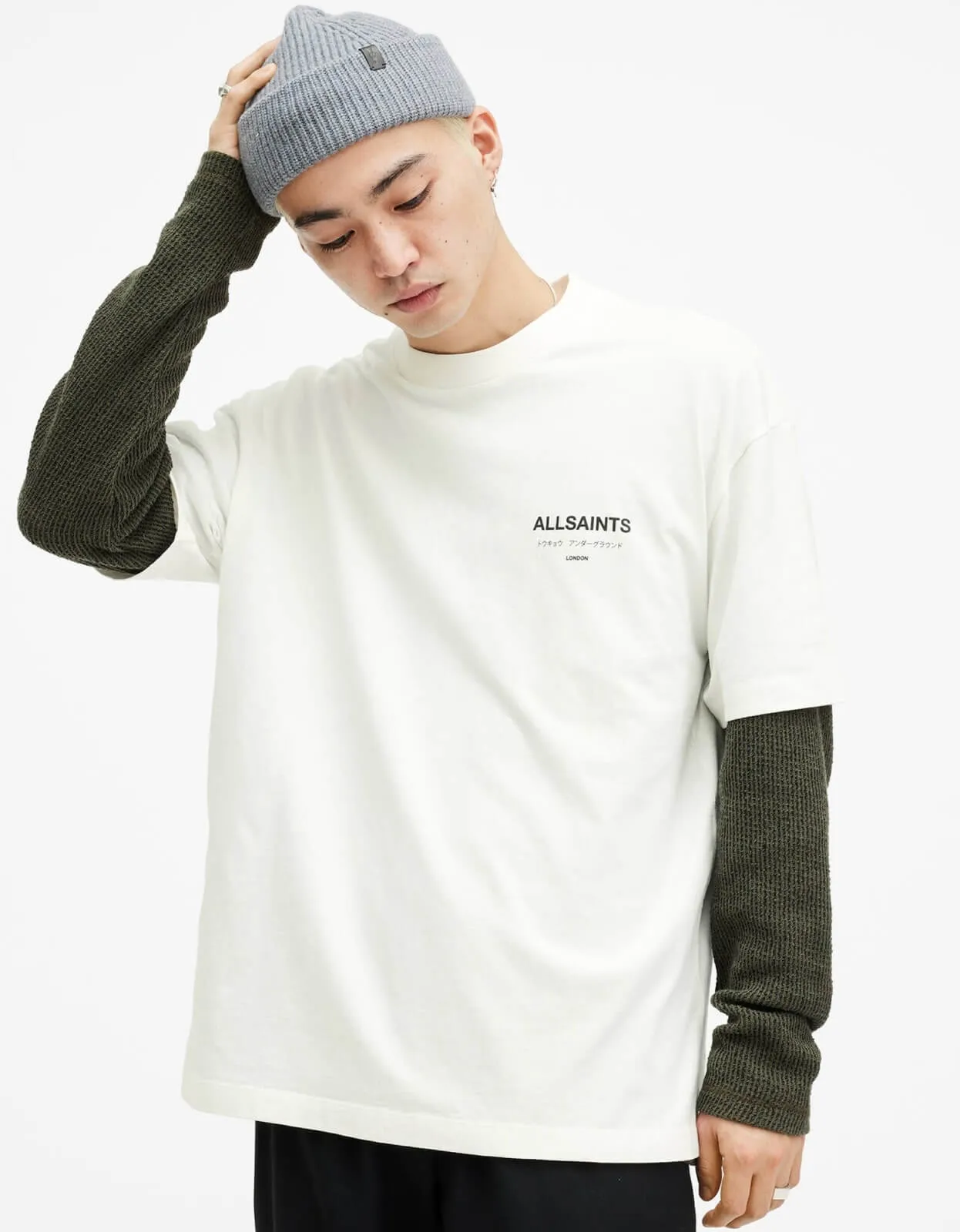 a women wearing coat.